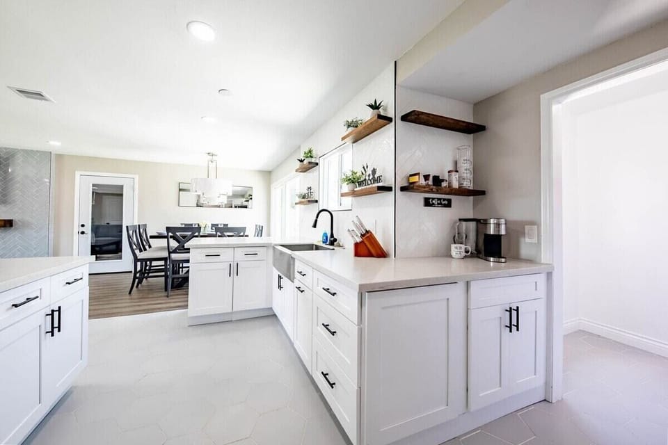 Modern kitchen space, equipped to accommodate your cooking needs. 