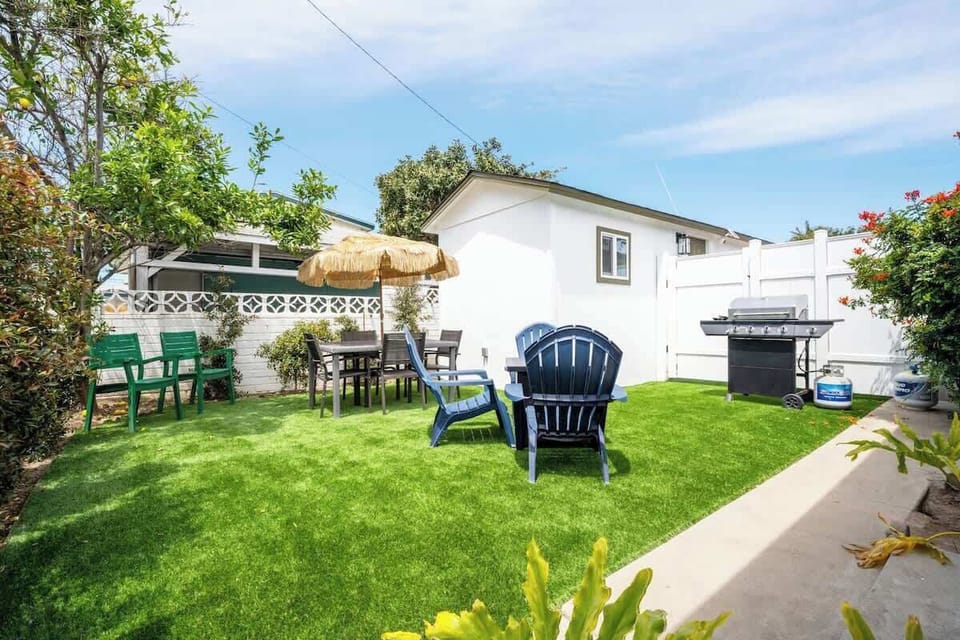 Relax and unwind in our beautiful yard! Private outdoor space with outdoor dining, lounge furniture, and a BBQ grill!