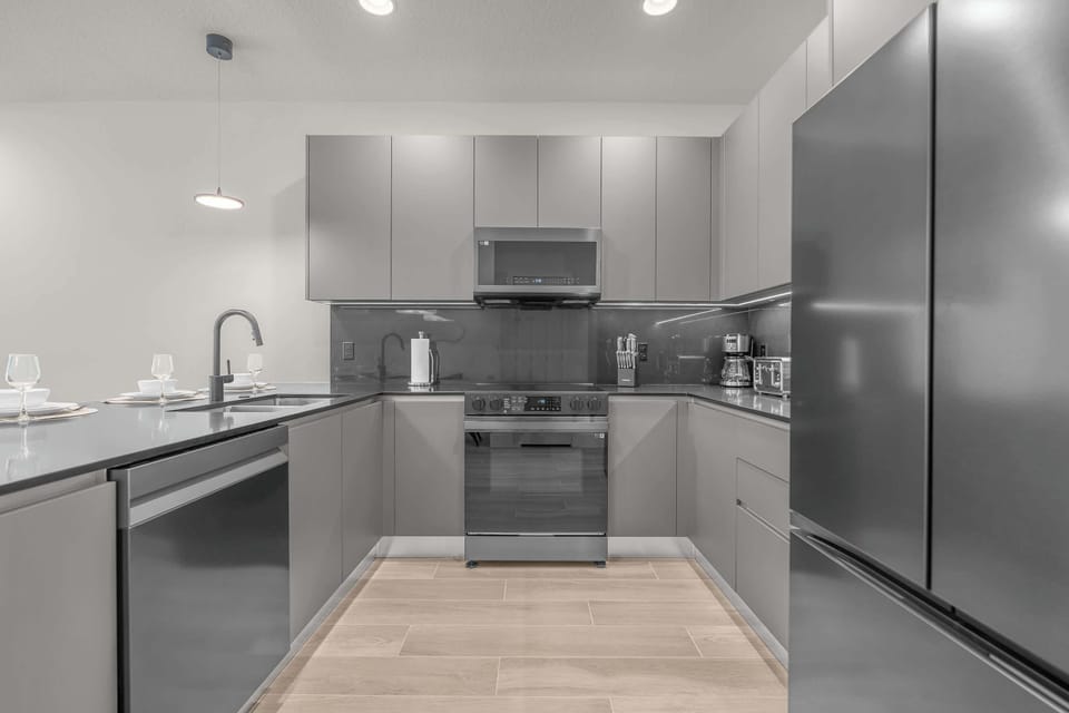 Fully Equipped Kitchen with Stainless Steel Appliances