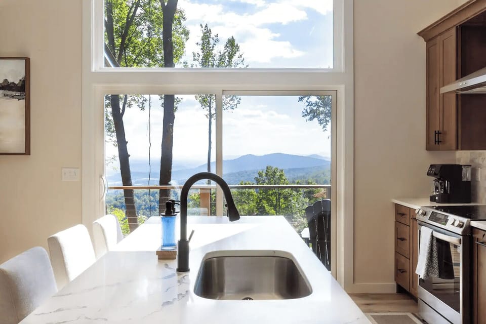 A beautiful view of the mountains inside the kitchen.