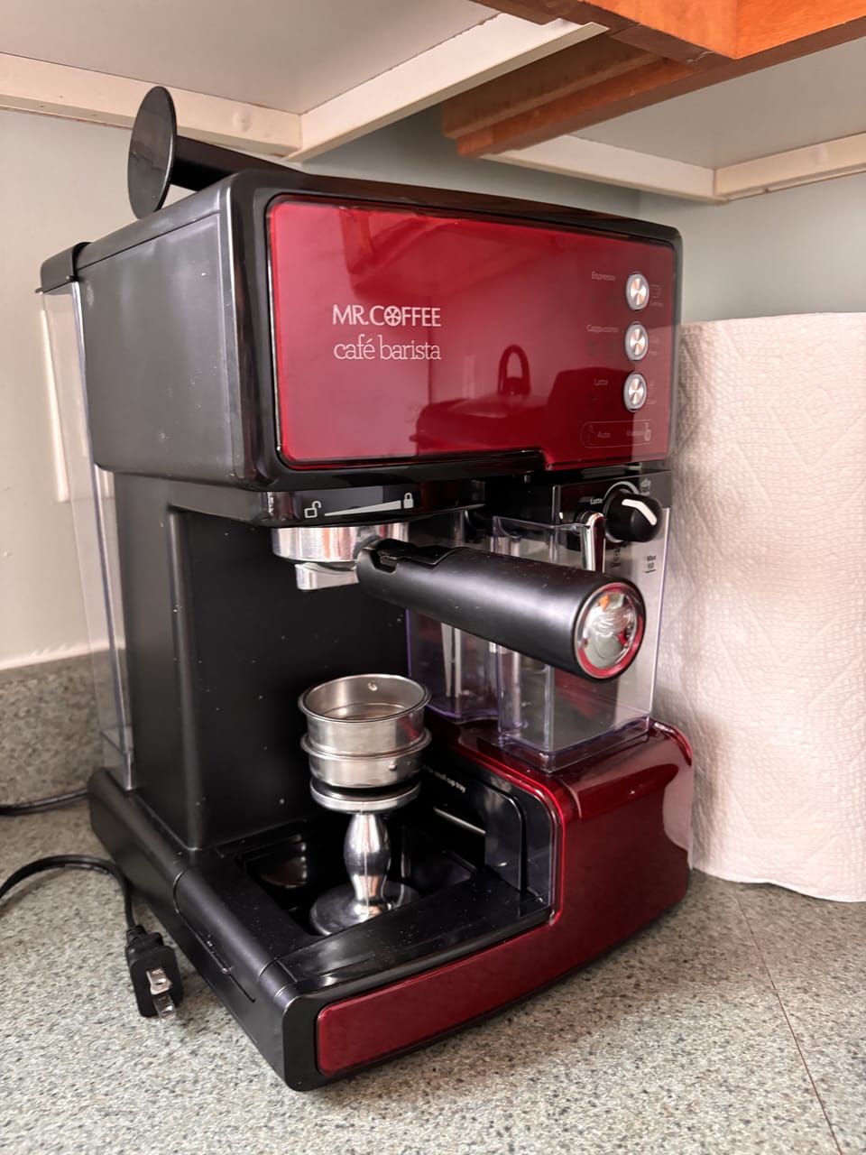 Espresso and cappuccino maker. Manual provided.