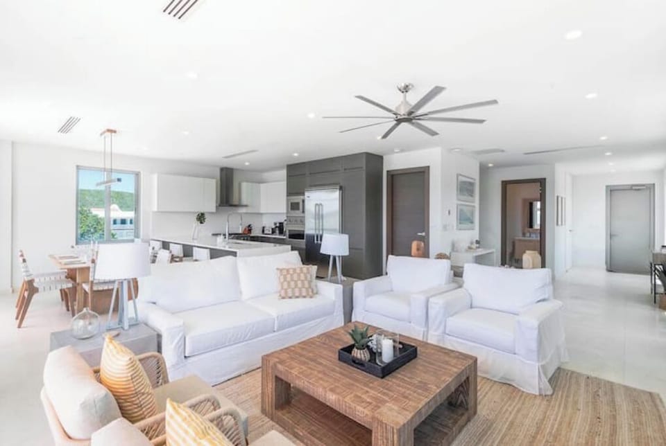 Living room with comfortable seating for seven.