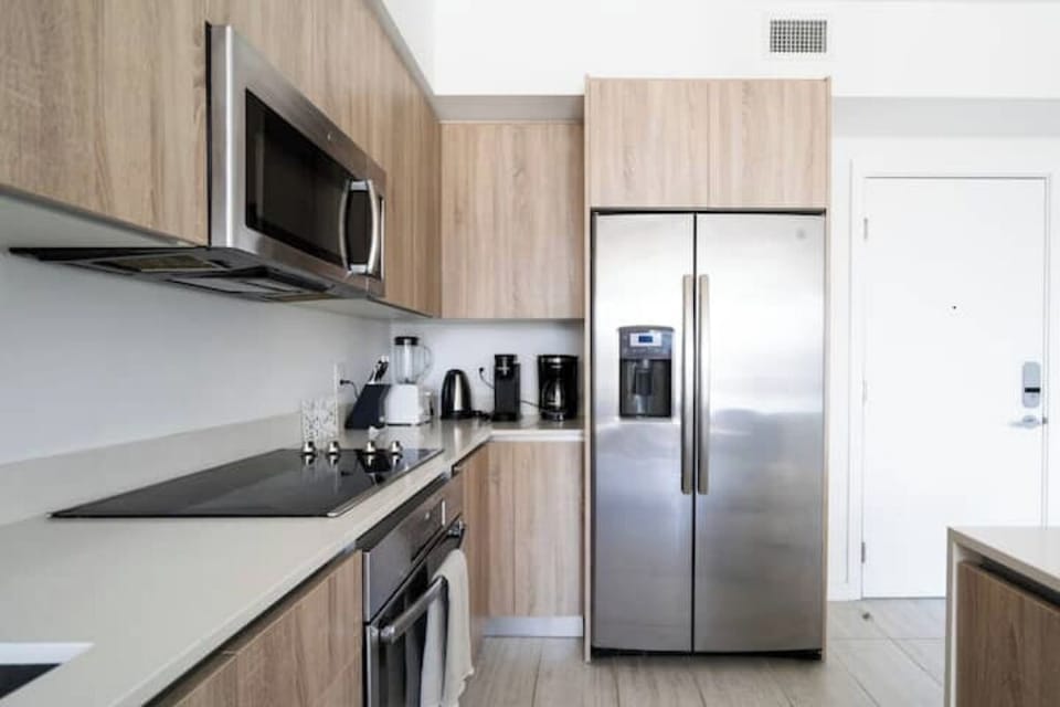 The kitchen is equipped with modern conveniences.