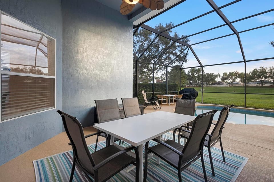 Enjoy a nice meal by the pool shaded from the elements.