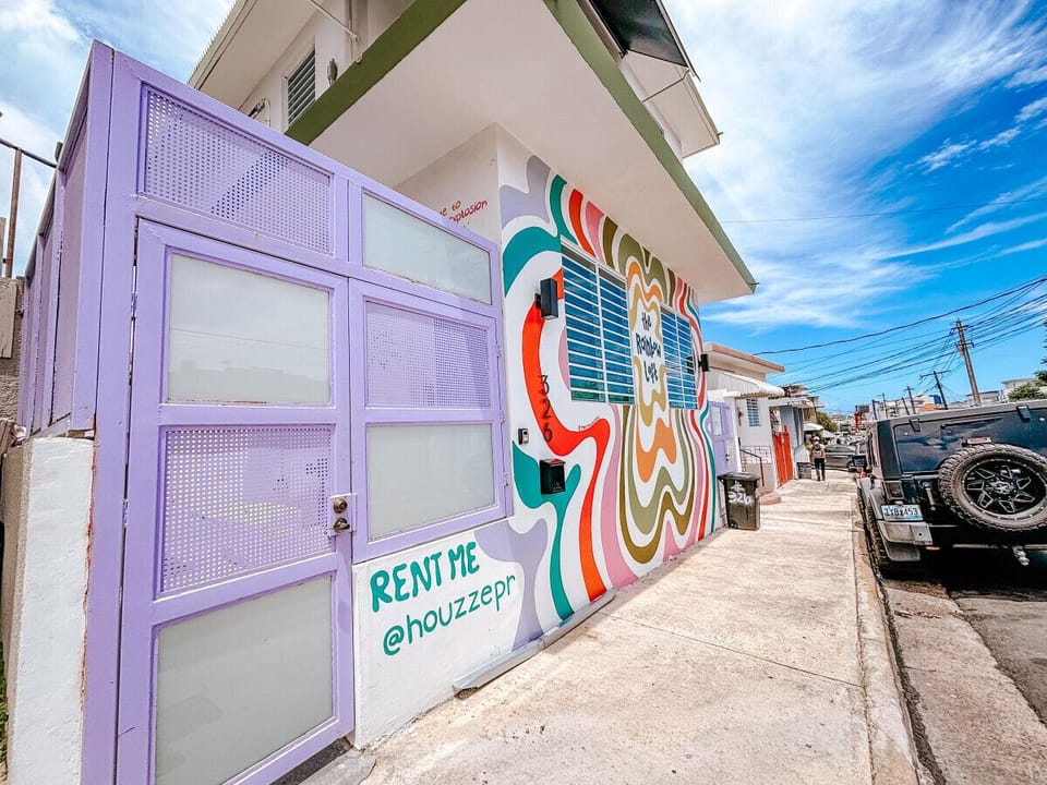 The inviting exterior of Rainbow Loft Apartment sets the tone for your stay.
