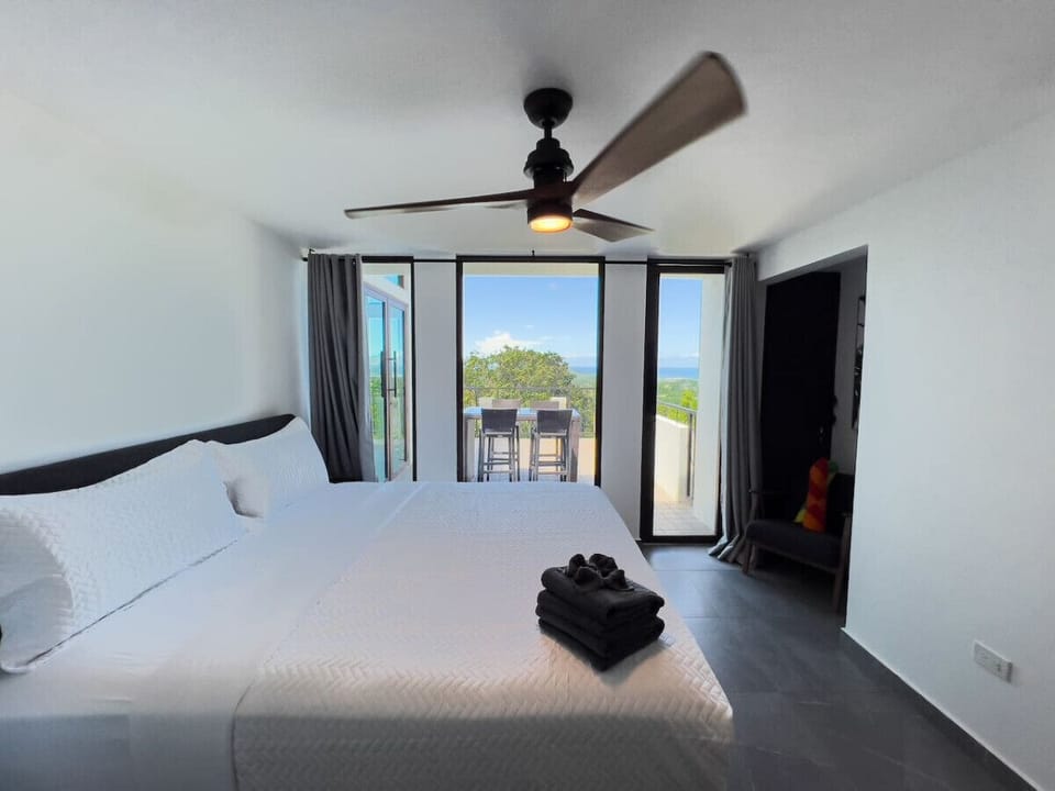 A peaceful retreat with soft linens and modern decor.