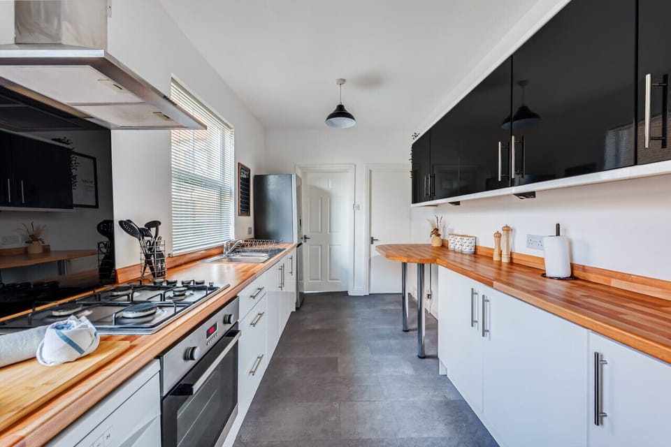 A fully equipped kitchen with everything you need to make a home cooked meal
