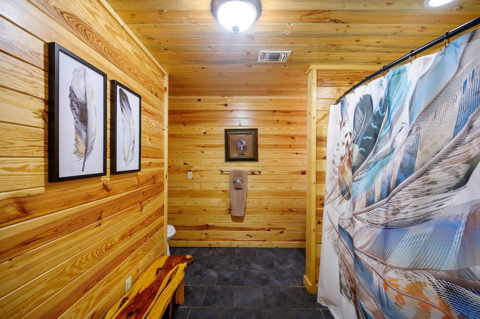 The en suite bath is spacious and provides plenty of room for two to get ready.