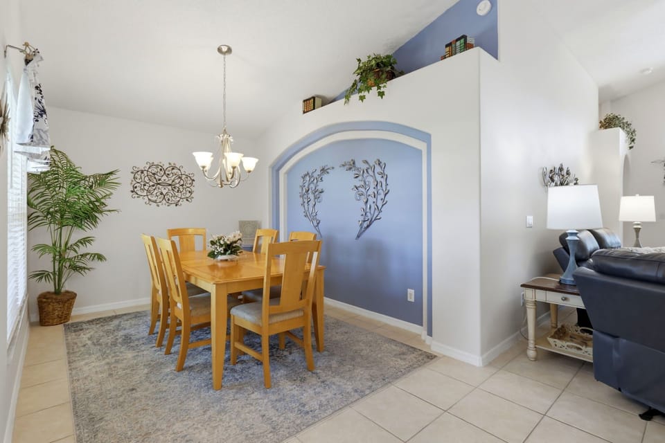 Dedicated dining space ideal for family dinners, game nights, or takeout after the parks.