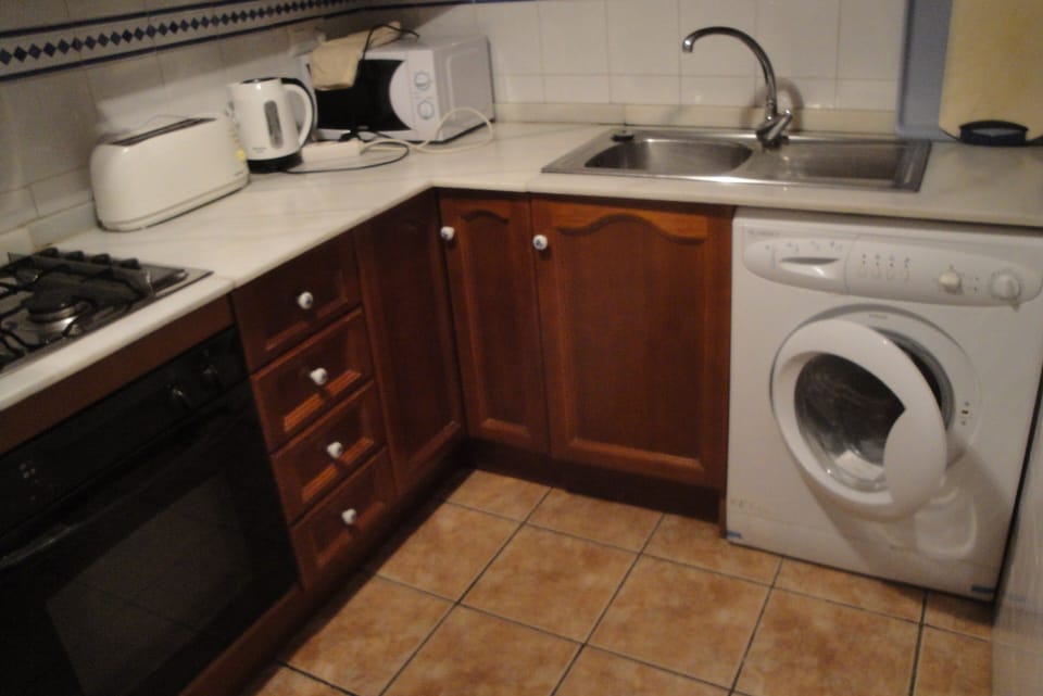 Kitchen (which includes a fridge freezer).