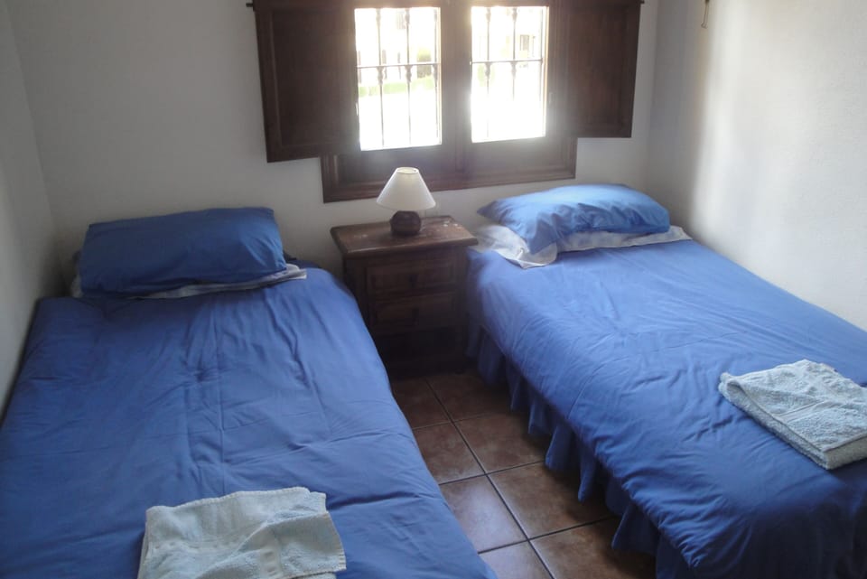 2nd bedroom (which includes double wardrobe and chest of drawers).
