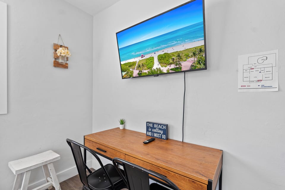 small desk for a quiet workspace. Just in case if you need it, Wit smart TV