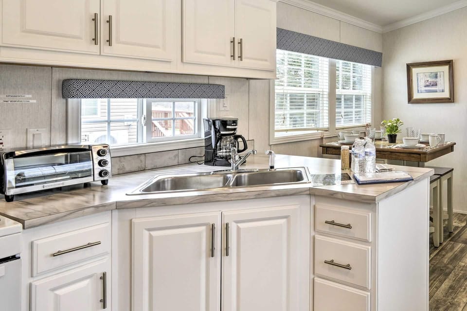 Bright, modern kitchen with ample natural light and sleek finishes