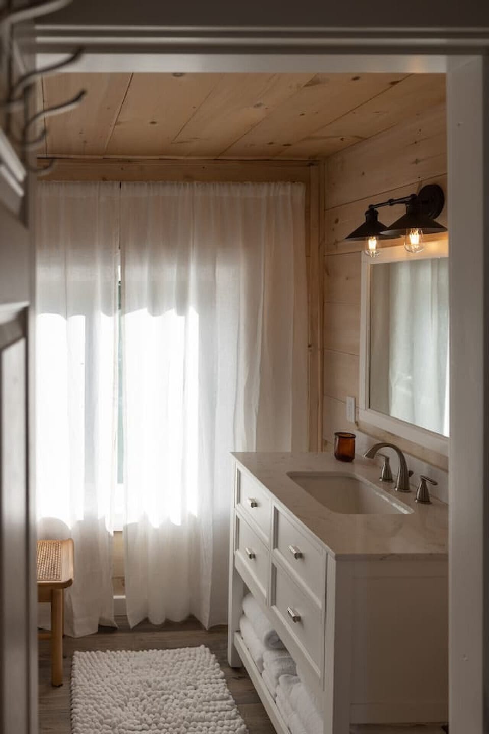 Full bathroom on the second floor is shared by all three rooms.