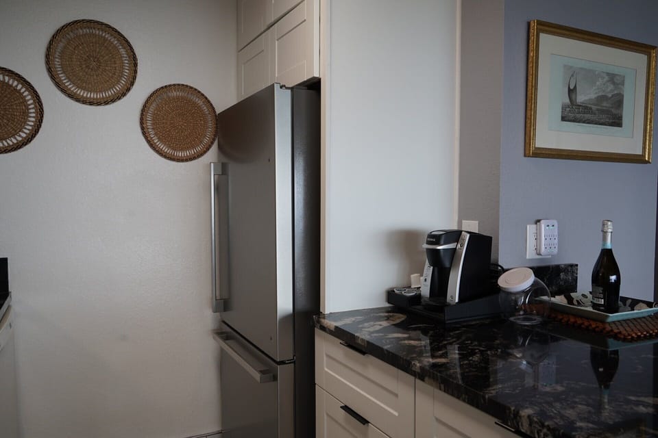 Stylish kitchen nook with coffee station and sleek modern finishes