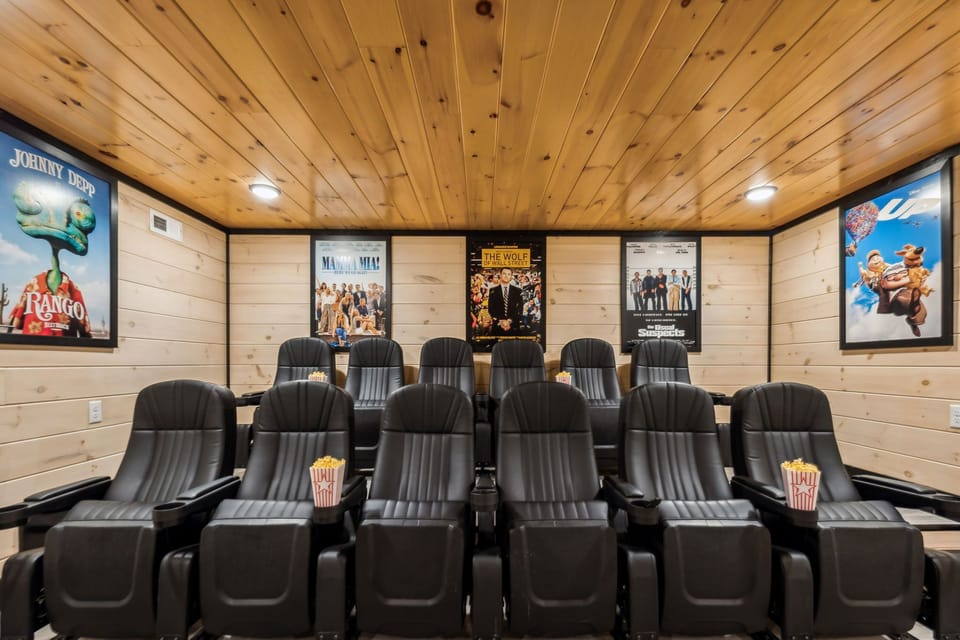 Cozy home theater with plush recliners,  and popcorn ready for movie night.