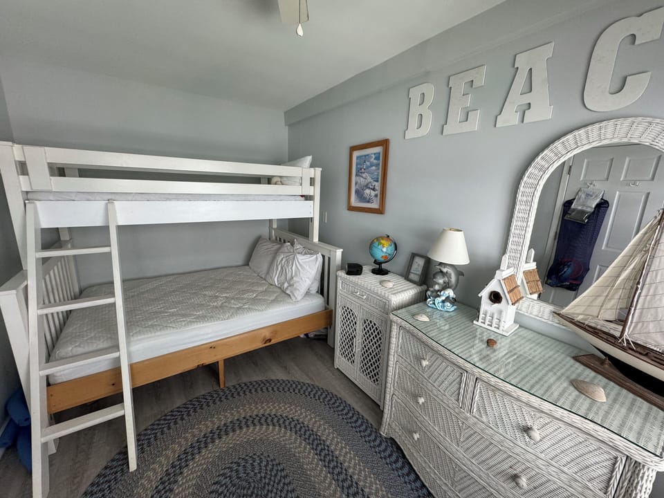 Second bed room.   Pyramid bunk bed.  Full size bed on bottom and single bed.