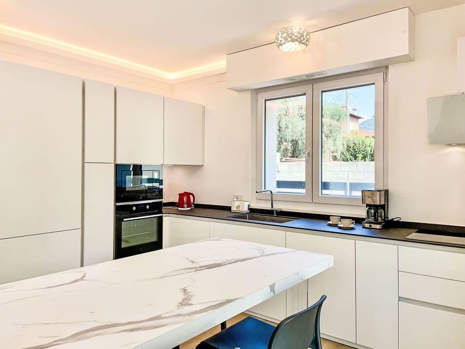 Cabinetry, Kitchen Sink, Property, Countertop, Window, Sink, Azure, Tap, Wood