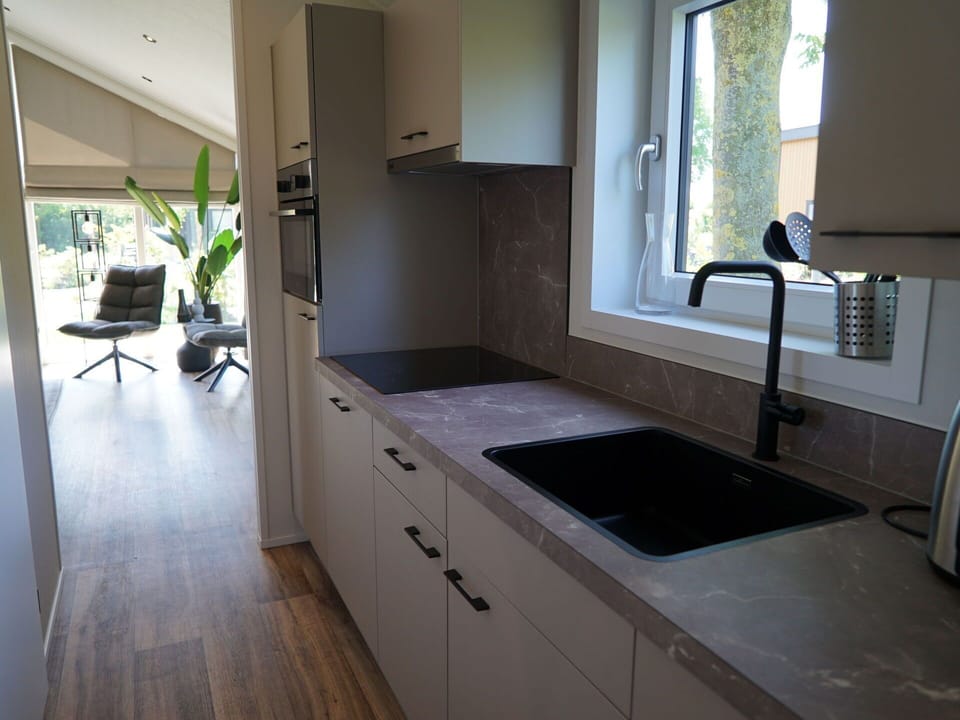Cabinetry, Kitchen Sink, Window, Countertop, Sink, Interior Design, Floor, Flooring, Wood