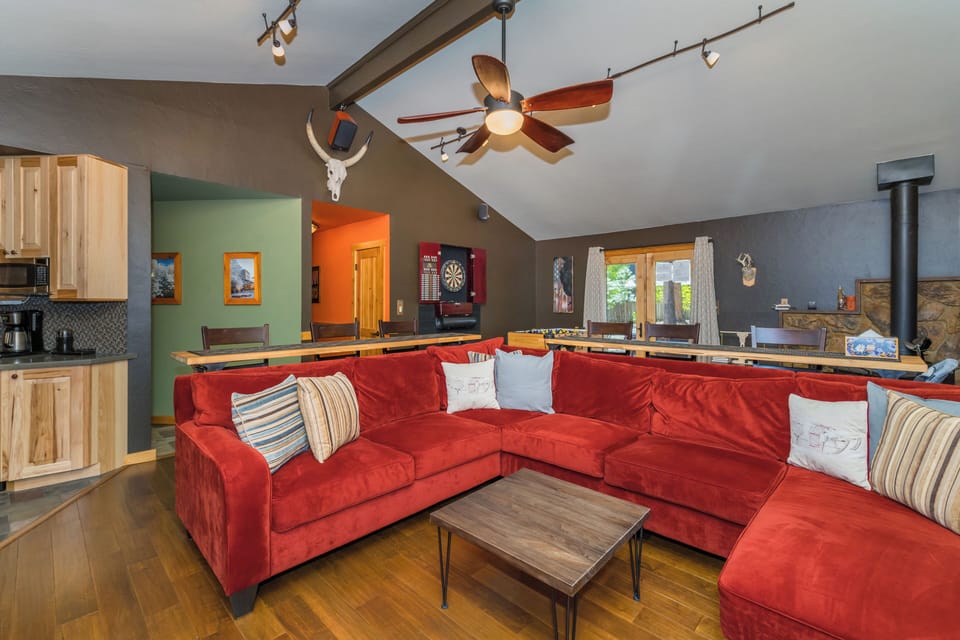 Plenty of Seating in Family Room with Ceiling Fan