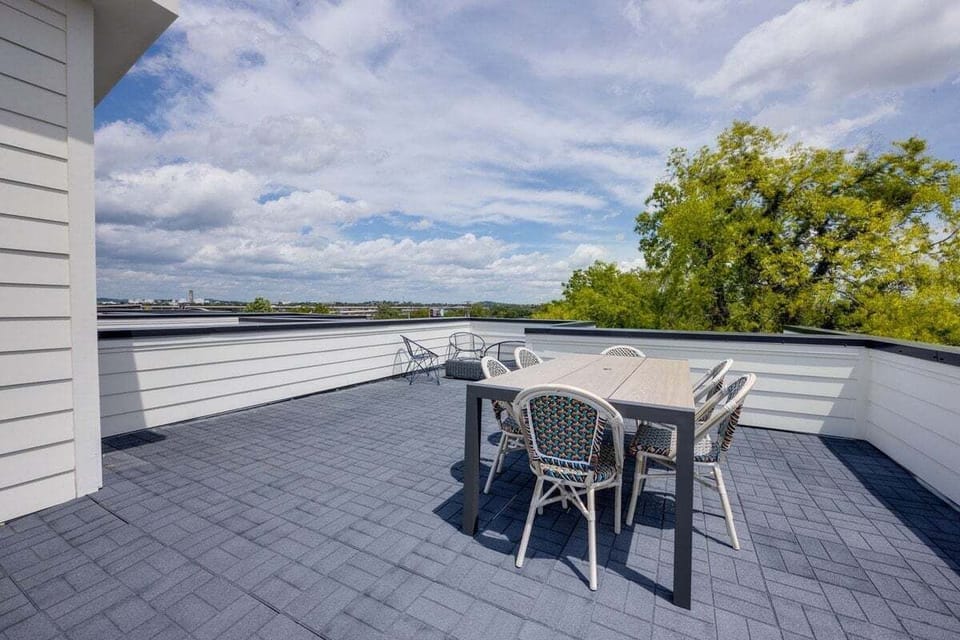 Private rooftop deck with comfortable seating and beautiful views