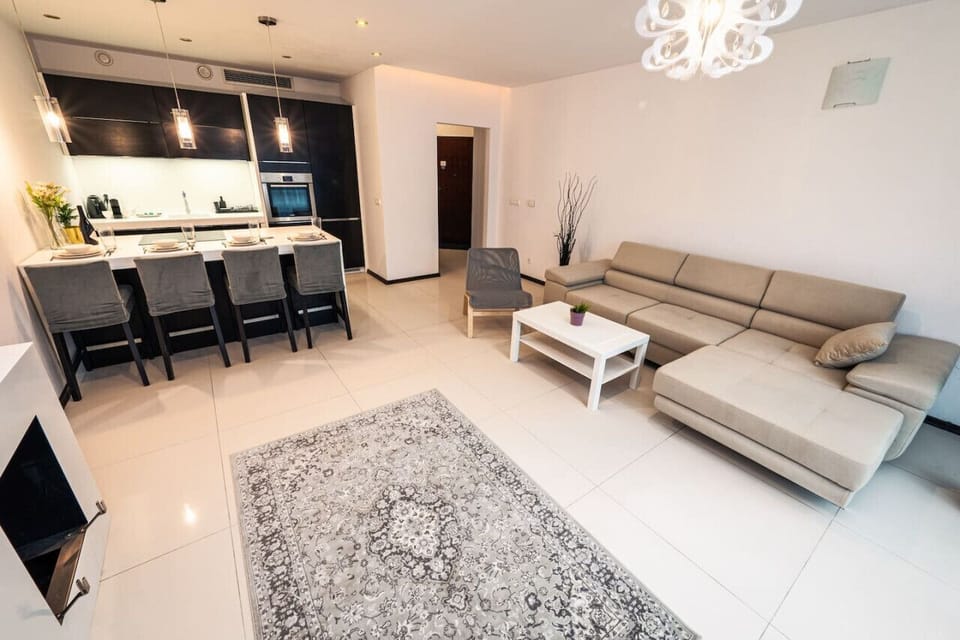 Comfortable Living Room with Sofa Bed and Smart TV | Book Now with RENTUJEMY