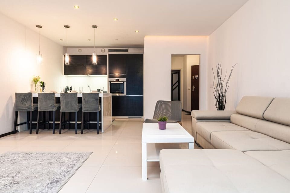 Comfortable Living Room with Sofa Bed and Smart TV | Book Now with RENTUJEMY