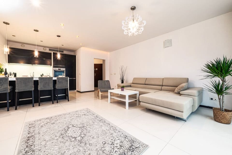 Comfortable Living Room with Sofa Bed and Smart TV | Book Now with RENTUJEMY