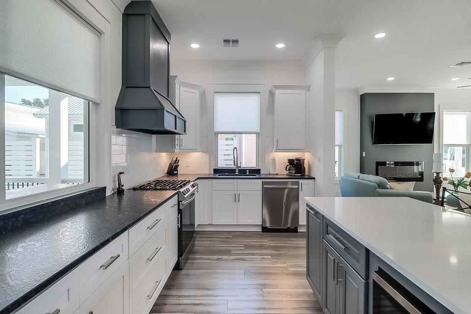 Expansive kitchen with pass through window to deck