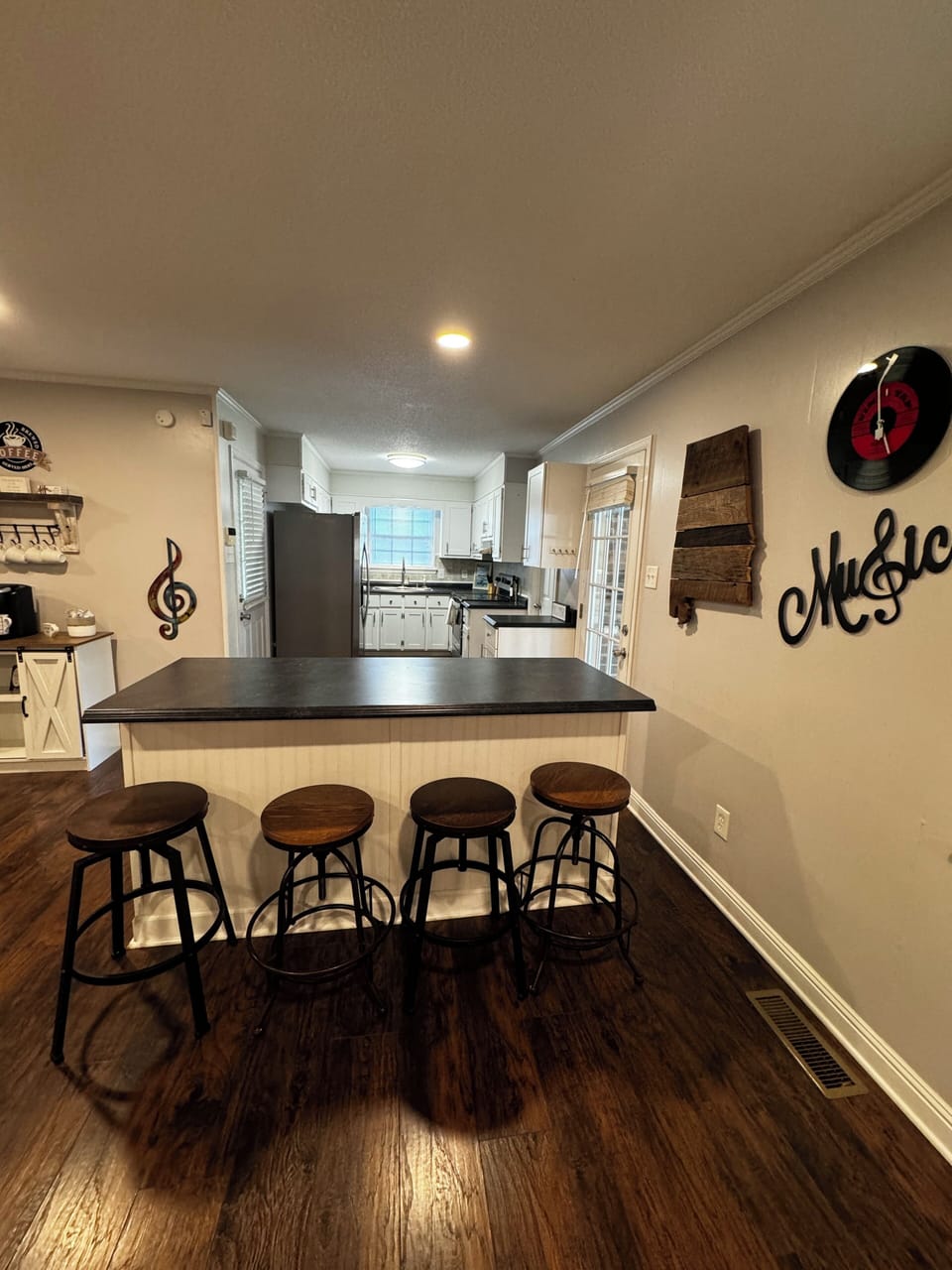 Kitchen with extra sitting area, fully stocked kitchen with dishwasher. 