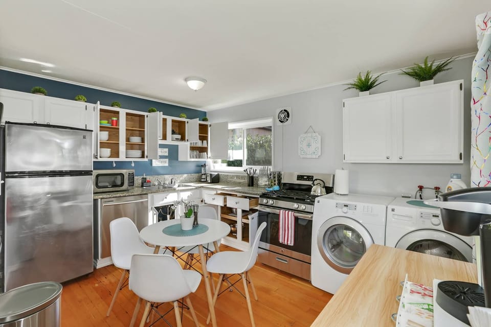 Fully stocked kitchen with SS appliances, ideal for home cooked meals