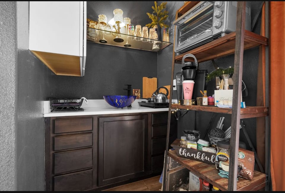 Kitchen w toaster oven, coffee, stove FULL SIZE REFRIGERATOR 