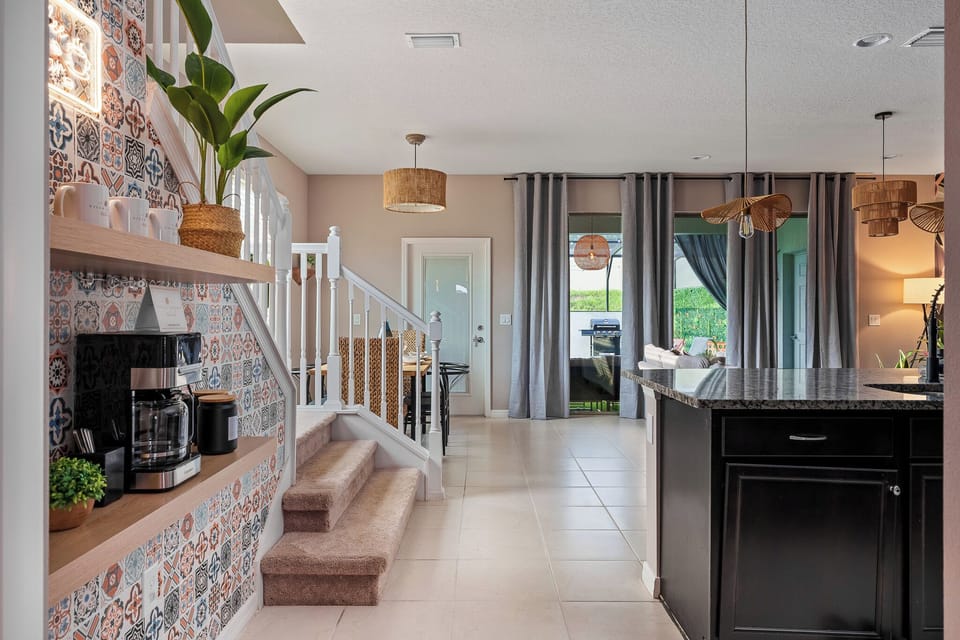 Spacious level entry to the coffee nook, kitchen, and to the living room.