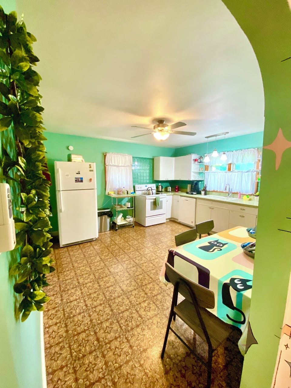Mid Century funky and fun kitchen. Kitchen table seats six comfortably. 