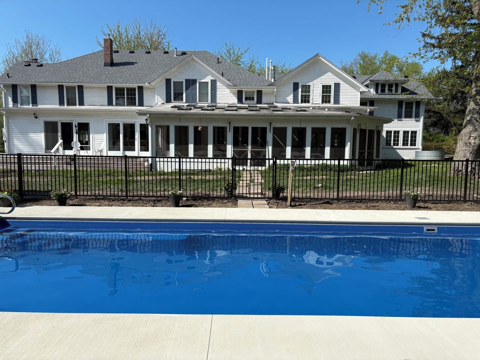 Private Inground Pool with Inn in Background