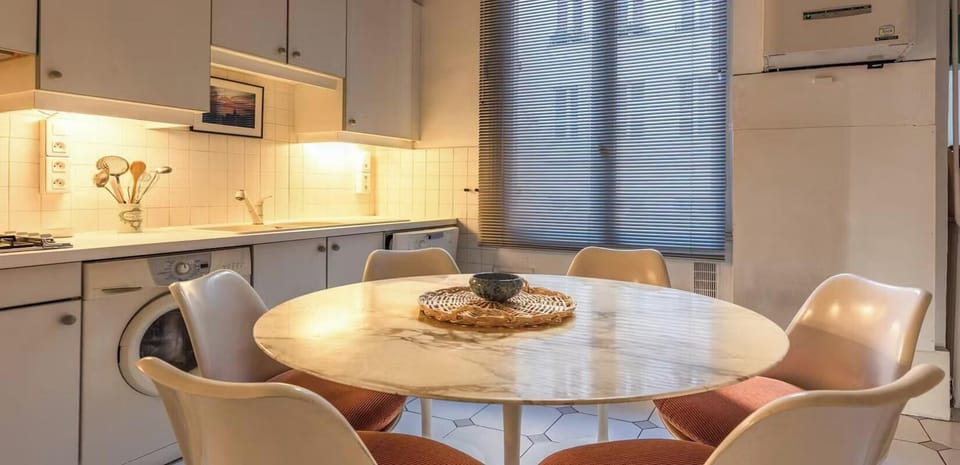 The 16 square meters separated eat in kitchen has a window facing courtyard 