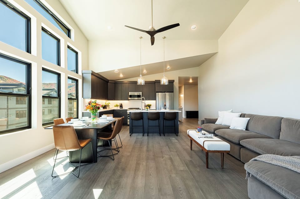 Main living space with large windows and open floor plan
