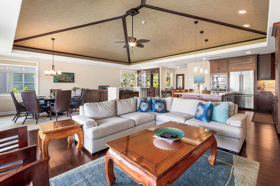 Open-concept living room on the second level with plenty of seating for relaxing or entertaining.