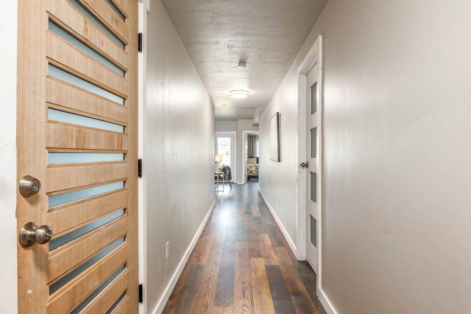 This long hallway separates Bed/Bath 2 from the great room and Bed/Bath 1