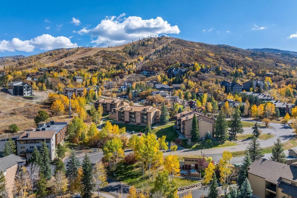 Nestled in the heart of Steamboat Resort, the condo is surrounded by colorful autumn trees and majestic mountain views.