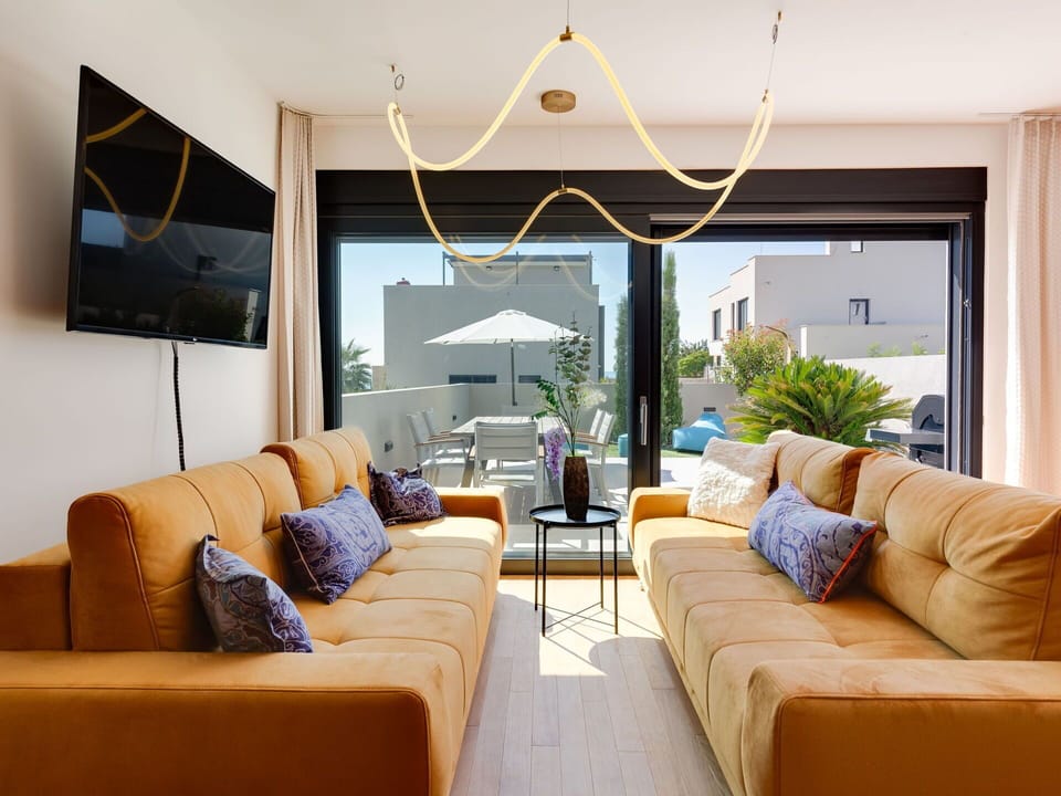 Furniture, Plant, Couch, Comfort, Window, Houseplant, Living Room, Studio Couch, Lamp, Building