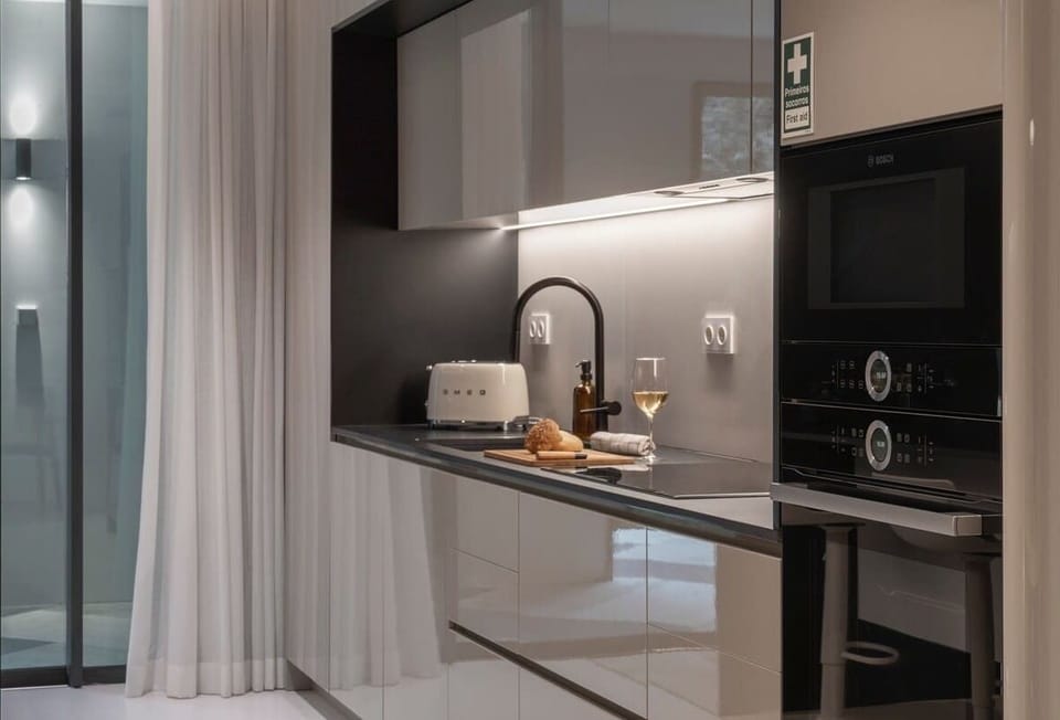 Another view of the fully equipped kitchen.