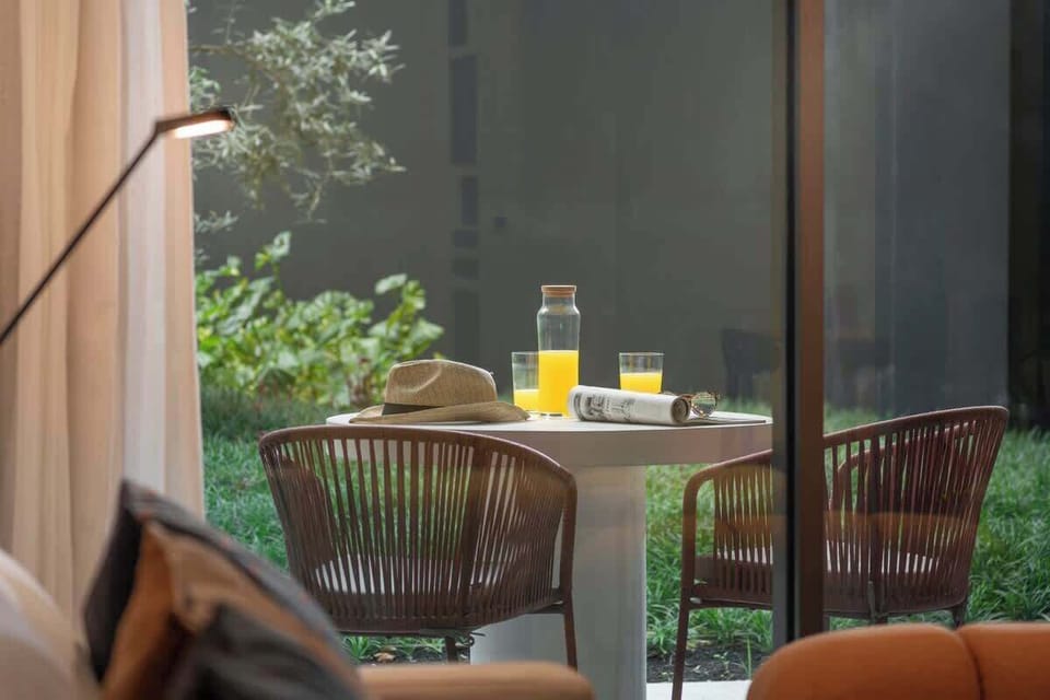 Our private garden terrace with outdoor dining area — a rare feature in central Funchal and perfect for breakfast or al fresco dining.