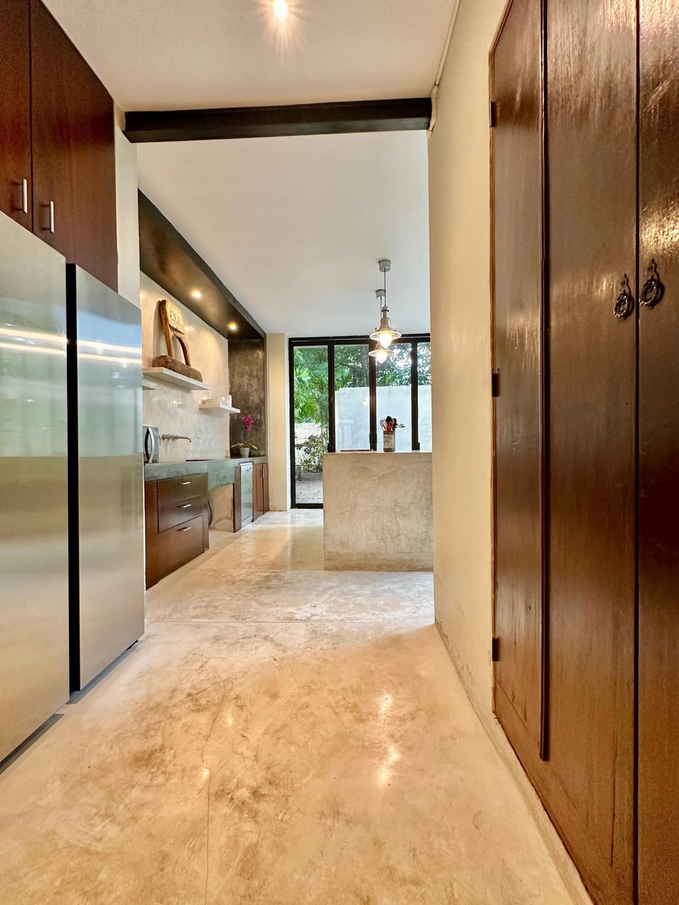 Entry to kitchen and closet for washer