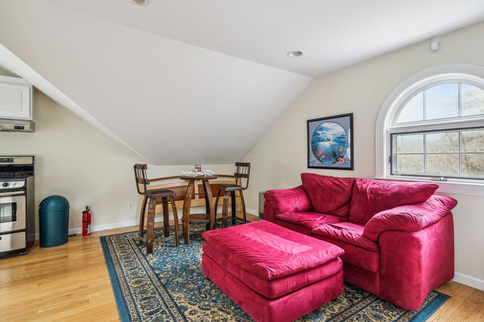Furniture, Indoors, Living Room, Floor, Flooring