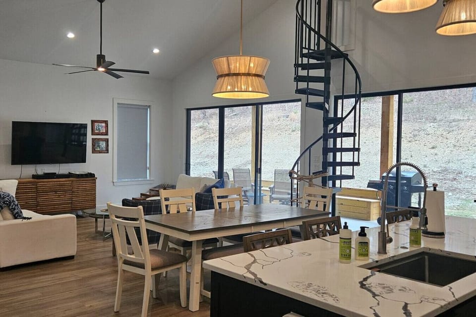 Main living room, kitchen and dining area for up to 8 guests to gather.