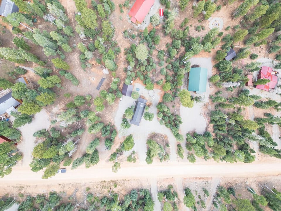 Charming A-frame cabin nestled in serene woodlands​