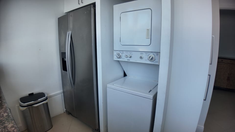 Washer and Dryer located in the kitchen