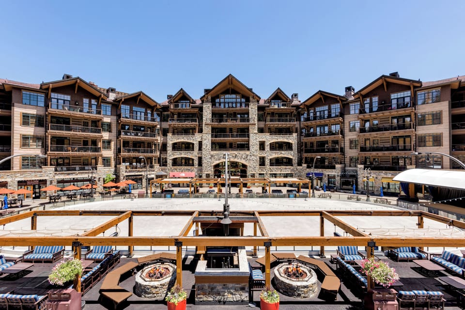 Savor mountain views from the expansive terrace, complete with inviting seating for enjoying a relaxing drink or meal.