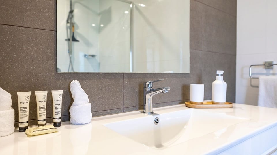 Well maintained bathroom with essentials